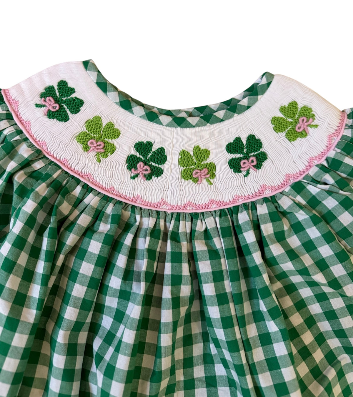 Up close hand smocked shamrocks