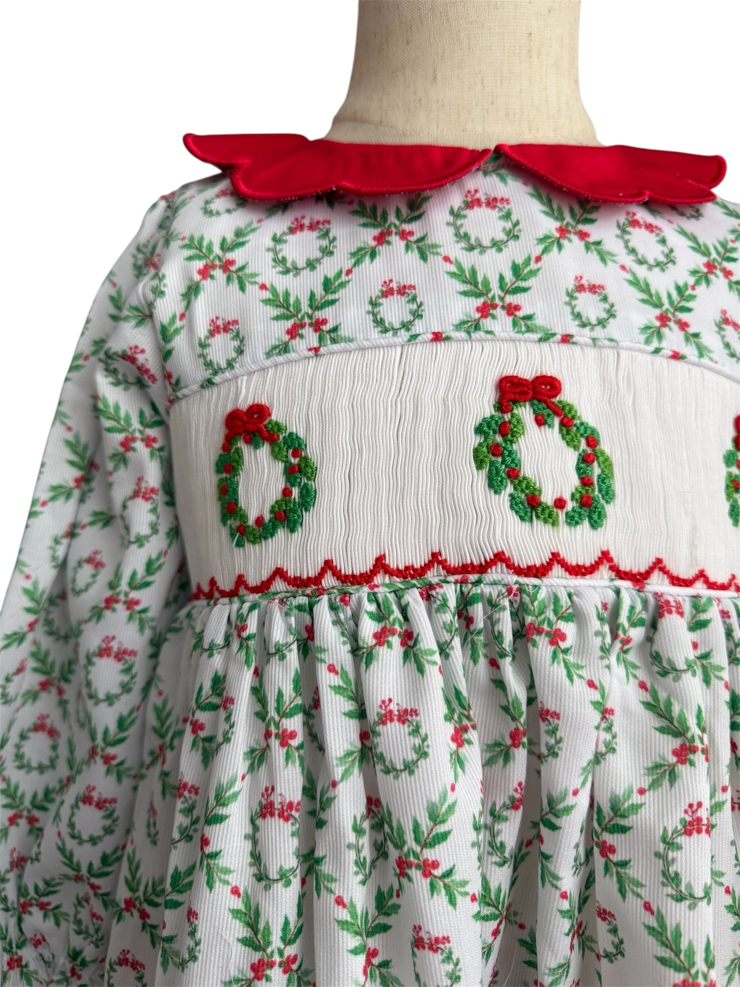 Girl’s Hand Smocked Christmas Wreath Dress with Scalloped Red Collar