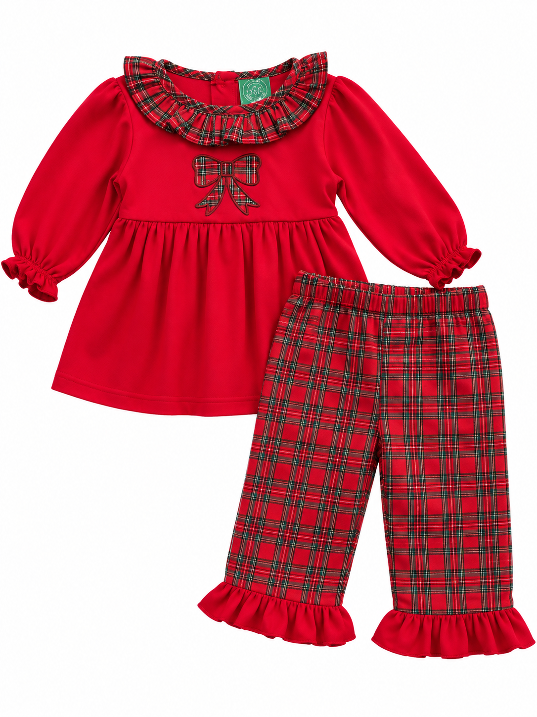 A toddler girl's holiday-themed two-piece outfit featuring a bright red long-sleeve top with a green and red plaid ruffled collar, a matching plaid bow on the chest, and matching red and green plaid pants with ruffled hems.