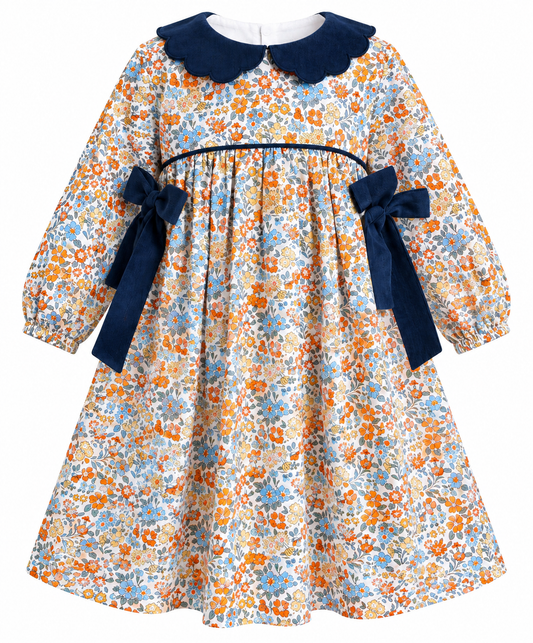 Girls’ floral long-sleeve dress with navy scalloped collar and navy side bows