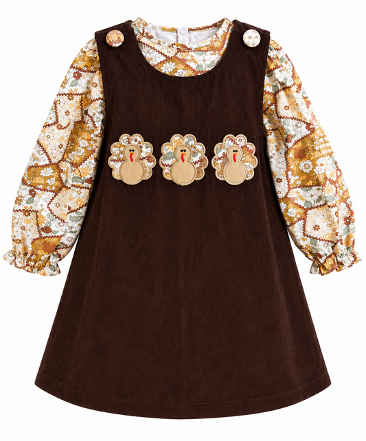 Girls’ brown corduroy Thanksgiving jumper dress with floral long-sleeve top and turkey appliqués