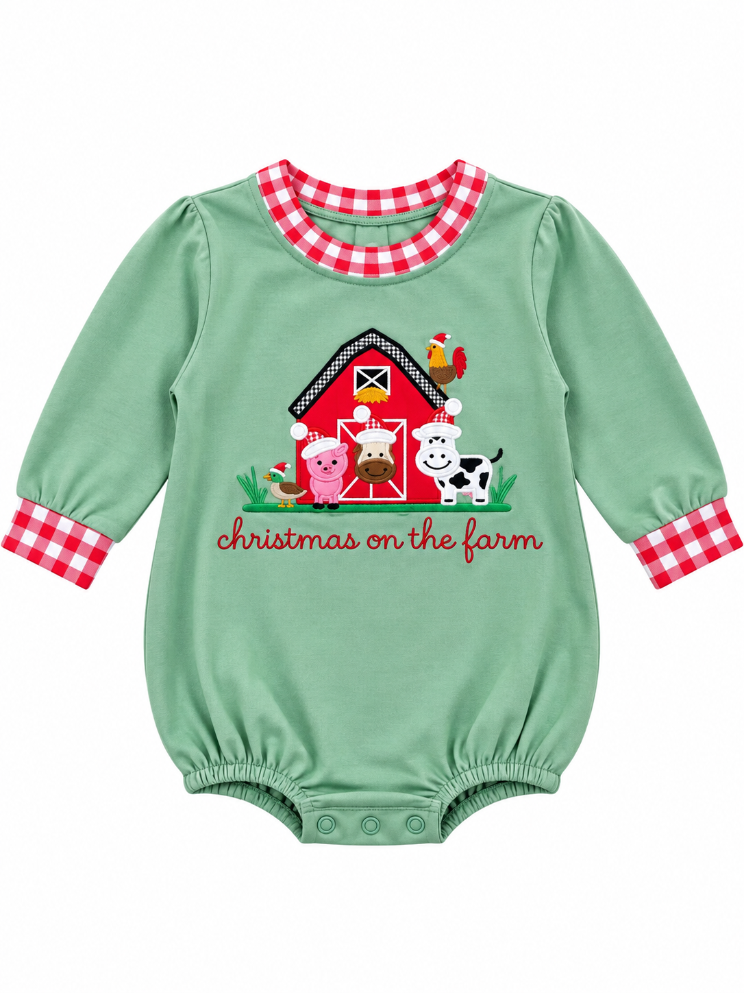 Boys’ sage green Christmas on the Farm bubble romper with long sleeves, red-and-white gingham trim, and a red barn appliqué with farm animals wearing Santa hats.
