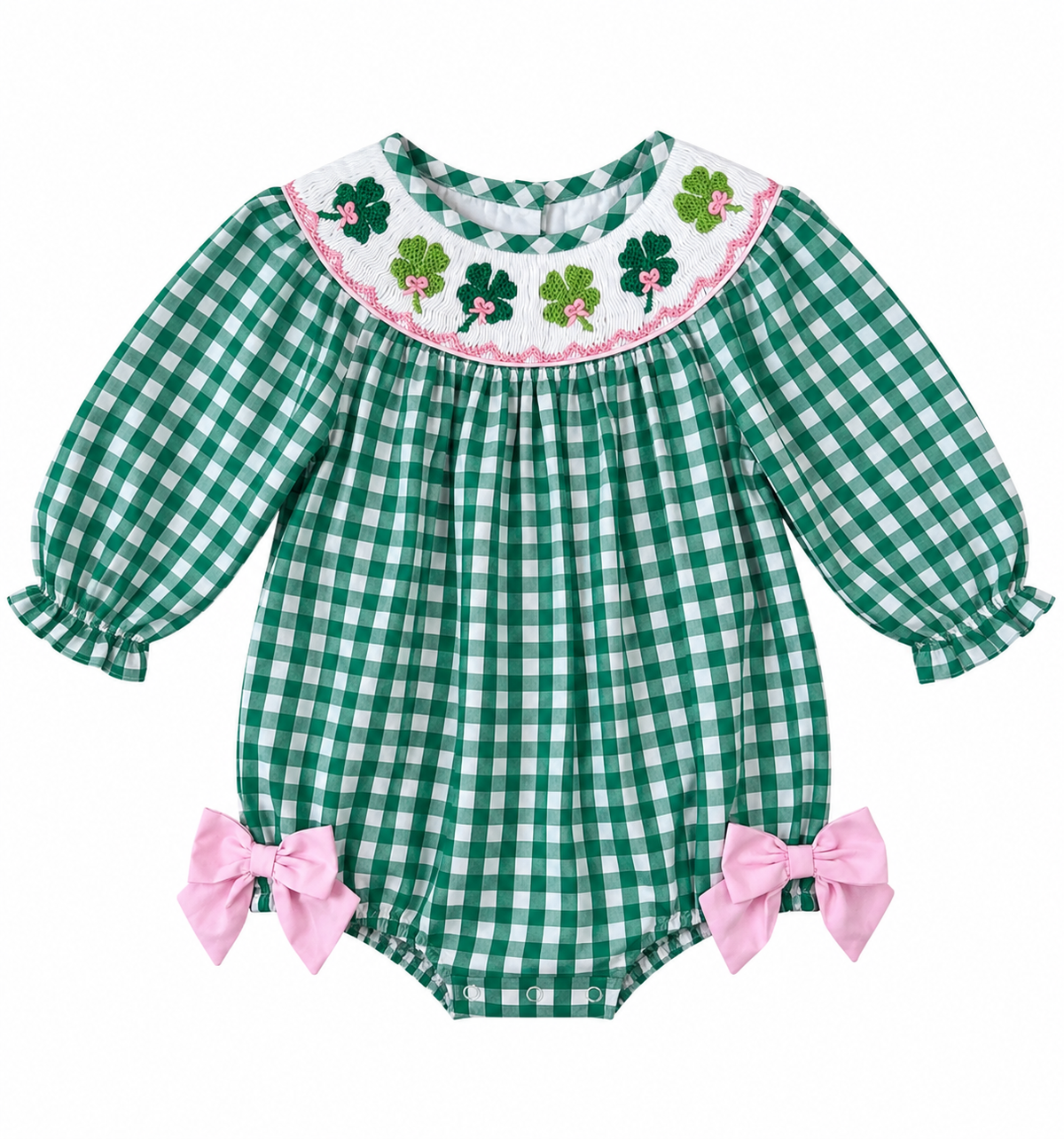 Girls’ green gingham St. Patrick’s Day bubble with hand-smocked shamrocks, pink bow accents, long sleeves, and ruffled cuffs.