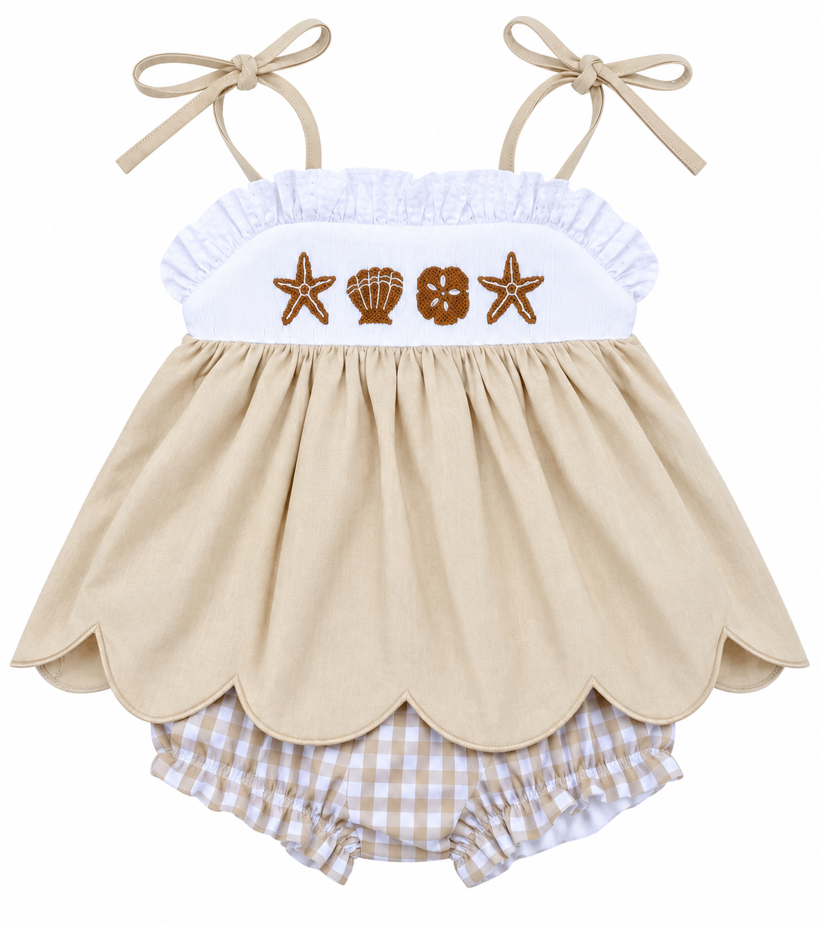 Girls’ beige beach dress with embroidered starfish and seashells, white ruffle bodice, tie straps, scalloped hem, and gingham bloomers.