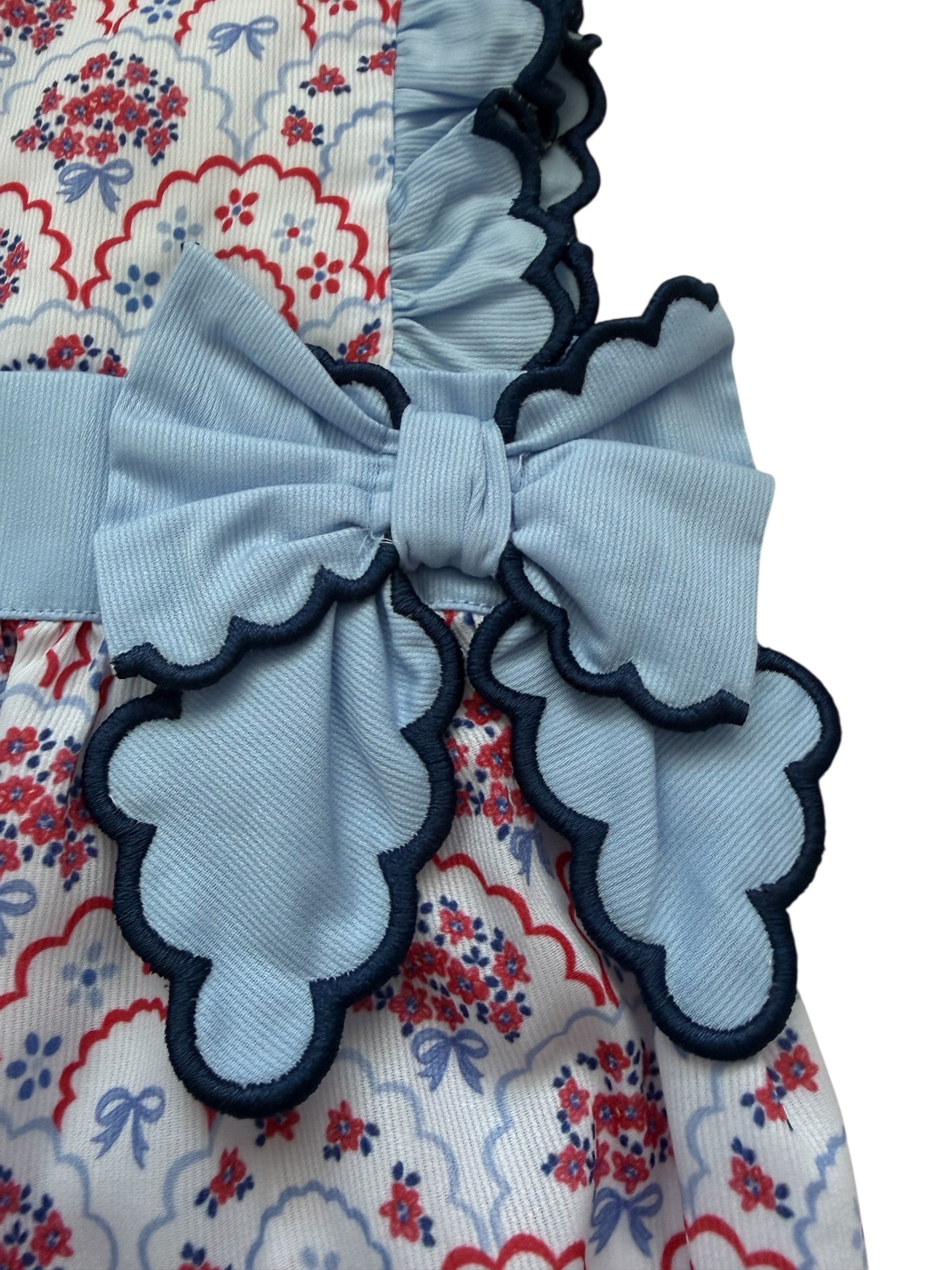 Fourth of July Floral Bow Girls Bubble – Patriotic Smocked Style with Scalloped Trim
